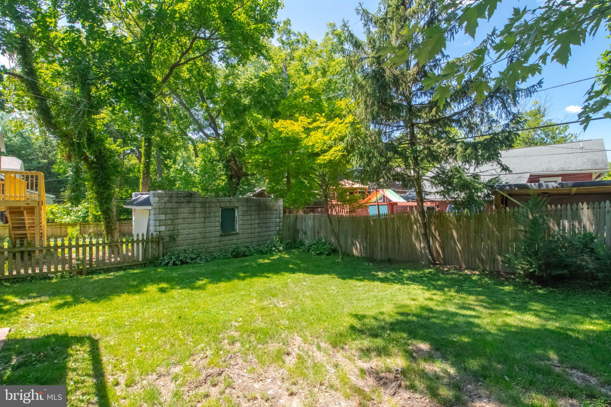5114 Norwood Road Baltimore, MD 21212 - Photo 43 of 54 Lush green oasis in a serene backyard.