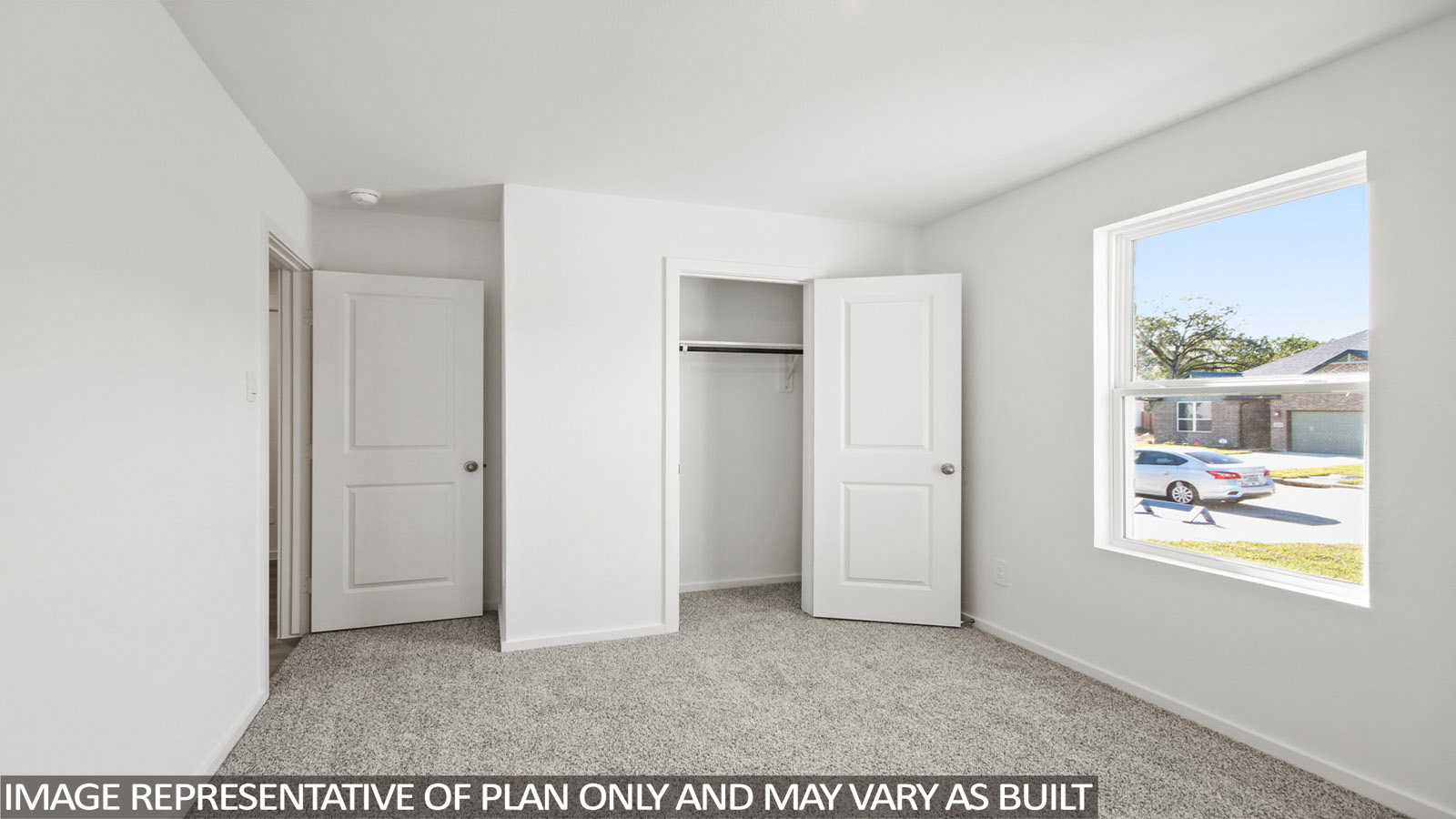 12205 Horseshoe Fld Bend Mustang Ridge, TX 78610 - Photo 12 of 20 a view of an empty room with a painting on the wall