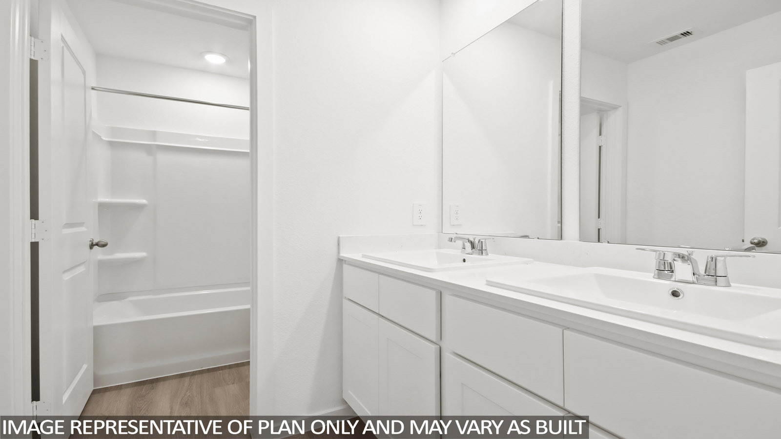 12205 Horseshoe Fld Bend Mustang Ridge, TX 78610 - Photo 10 of 20 a bathroom with a tub sink and mirror