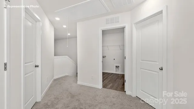 wooden floor with closet area