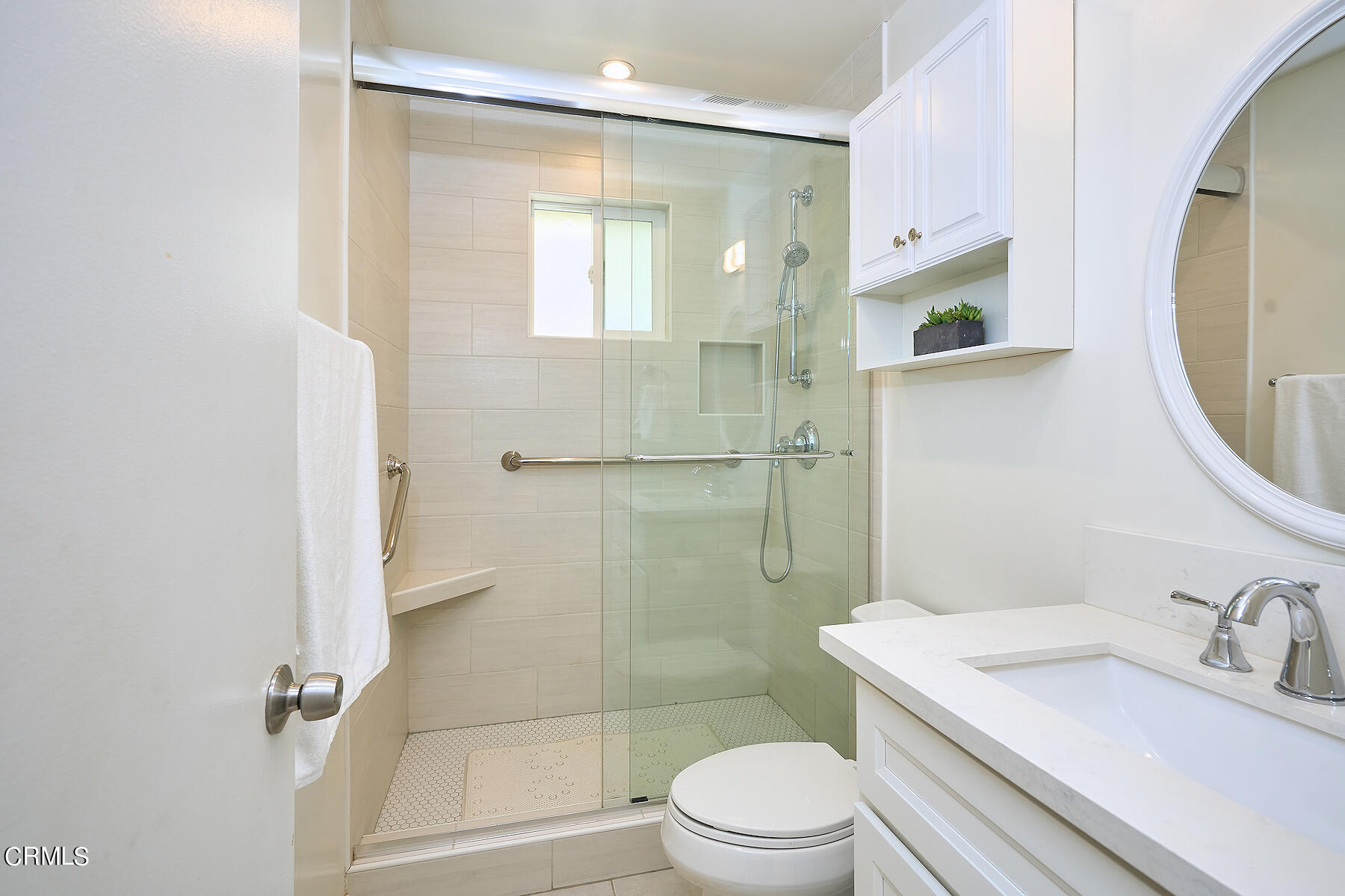 515 De Anza Way Oxnard, CA 93033 - Photo 21 of 48 a bathroom with a granite countertop sink toilet and shower