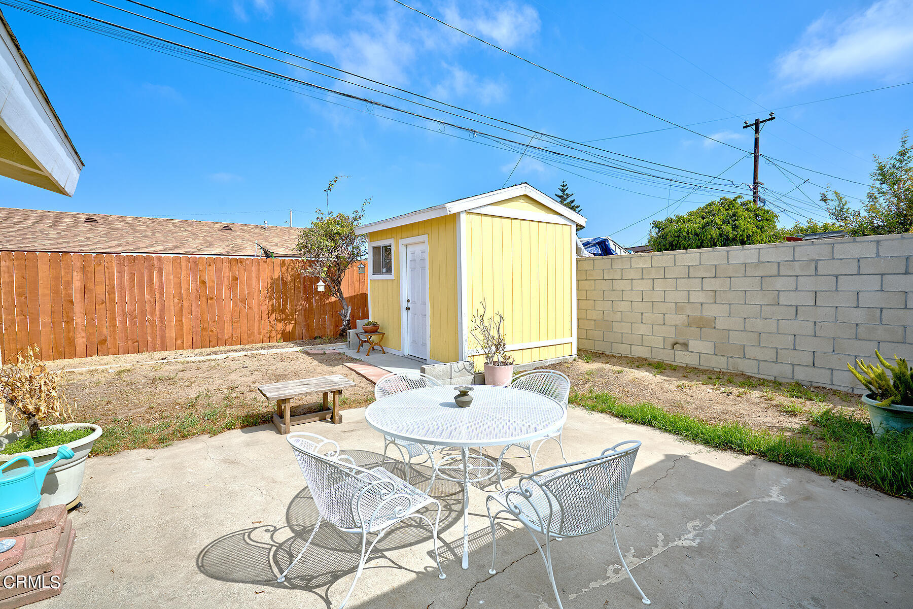 515 De Anza Way Oxnard, CA 93033 - Photo 27 of 48 a view of a backyard with table and chairs