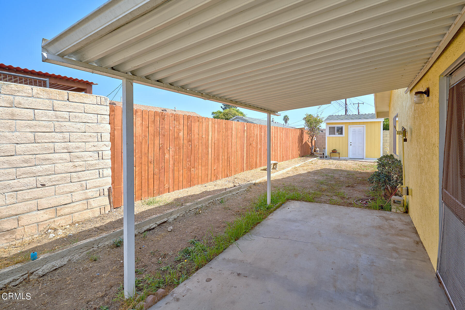 515 De Anza Way Oxnard, CA 93033 - Photo 33 of 48 a backyard of a house with seating space