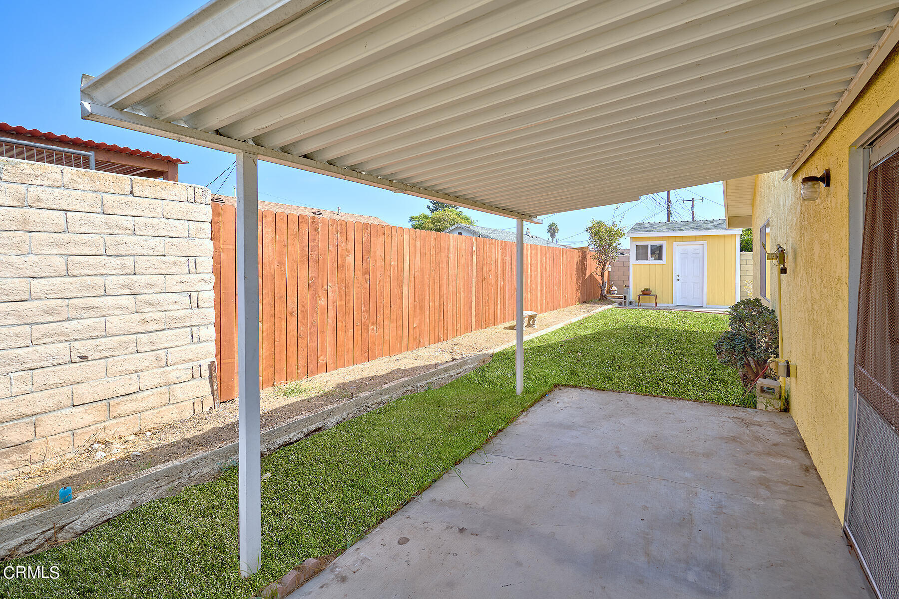 515 De Anza Way Oxnard, CA 93033 - Photo 34 of 48 a view of a backyard with wooden fence