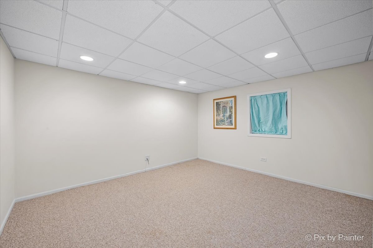 20 Lochbrook Lane Inverness, IL 60010 - Photo 17 of 27 an empty room with a empty space and windows