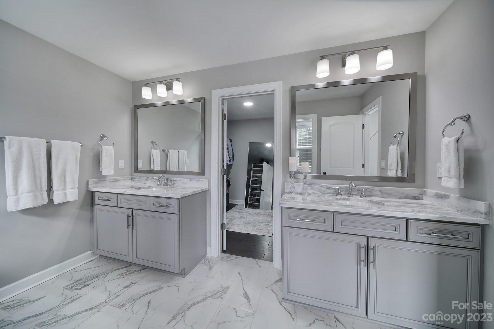 174 Hampton Trail Drive Fort Mill, SC 29708 - Photo 23 of 44 a bathroom with a granite countertop double vanity sink and a mirror