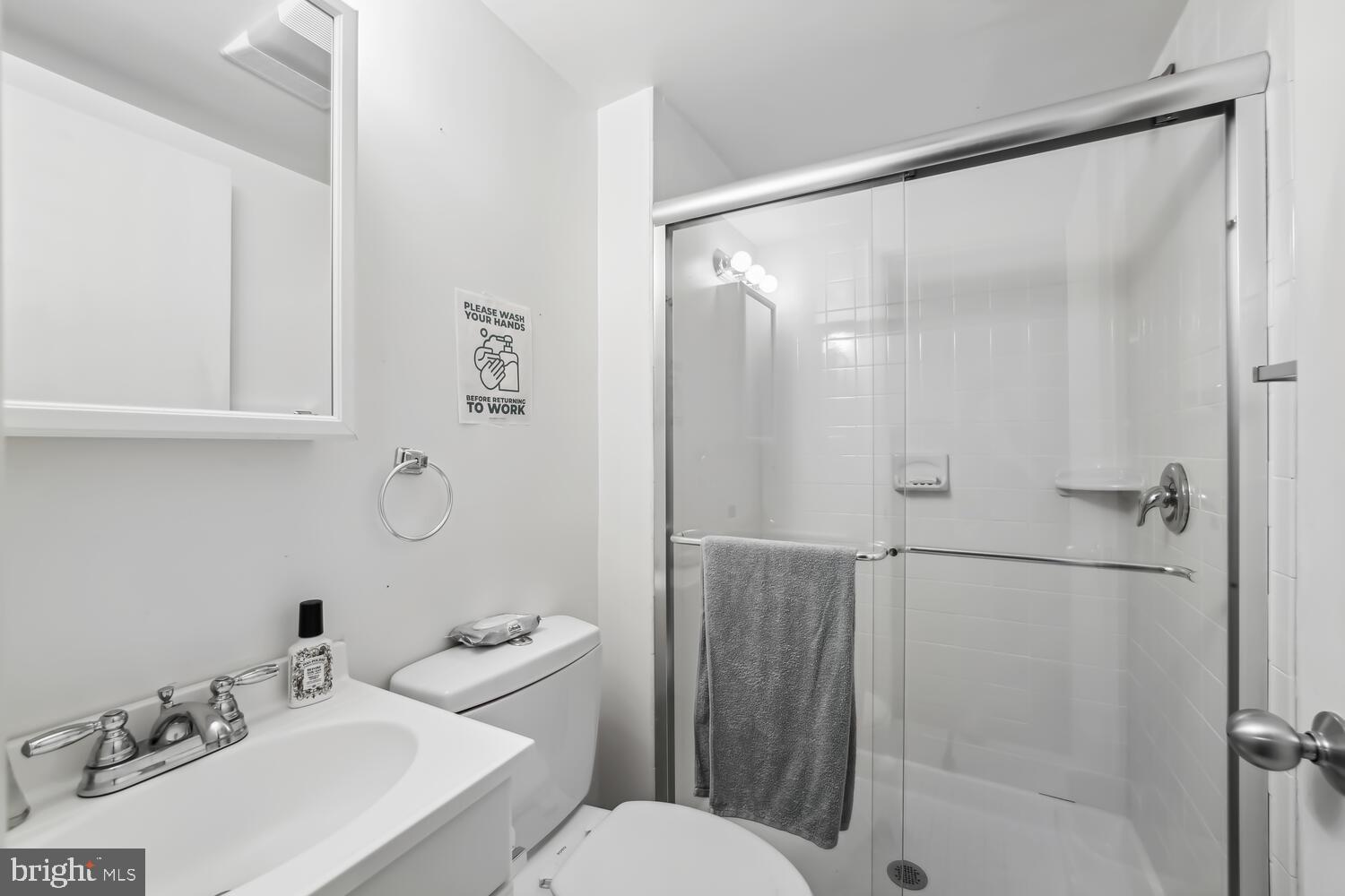 2370 Champlain Street Northwest, Unit 12 Washington, DC 20009 - Photo 15 of 17 three bathrooms (2-full and 1-half)