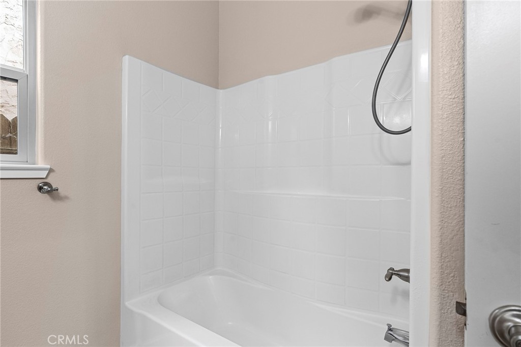 3 Sunflower Court Chico, CA 95926 - Photo 30 of 40 a bathroom with a bath tub with a shower