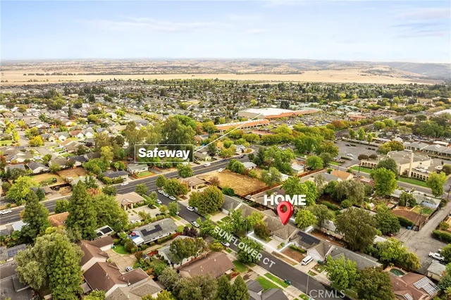 an aerial view of residential building and ocean