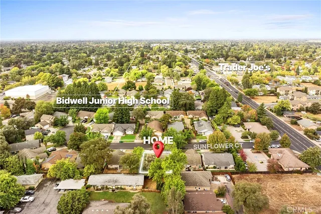an aerial view of residential building and parking space