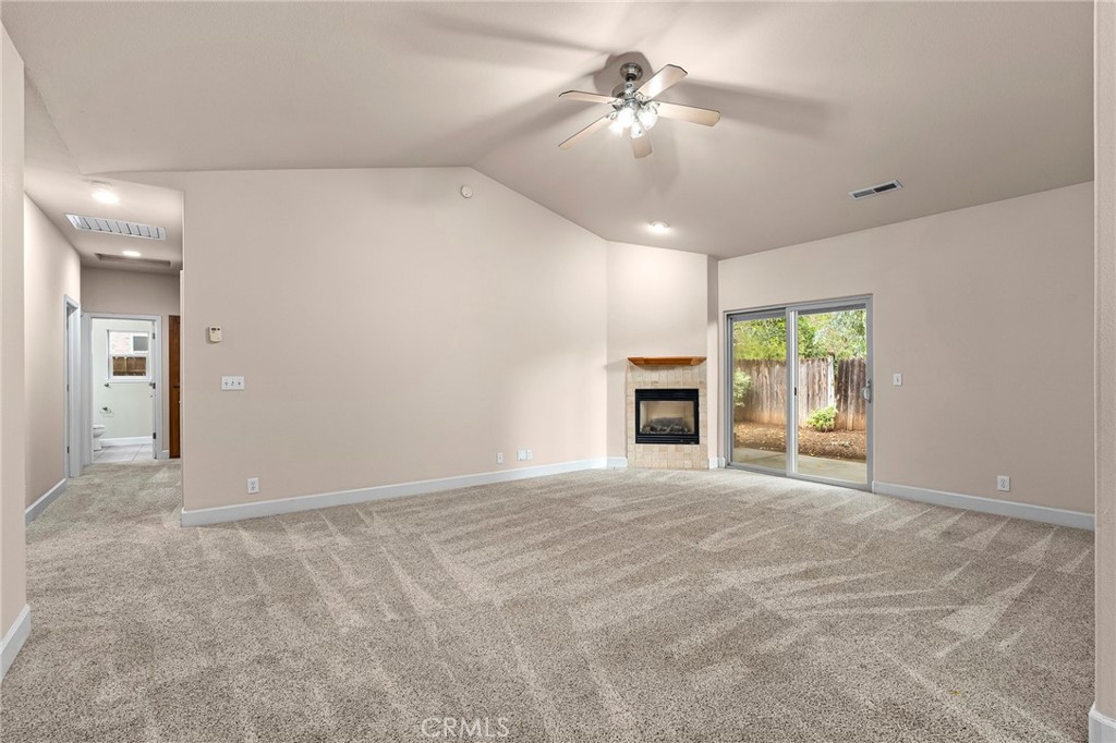 3 Sunflower Court Chico, CA 95926 - Photo 9 of 40 an empty room with fan and windows