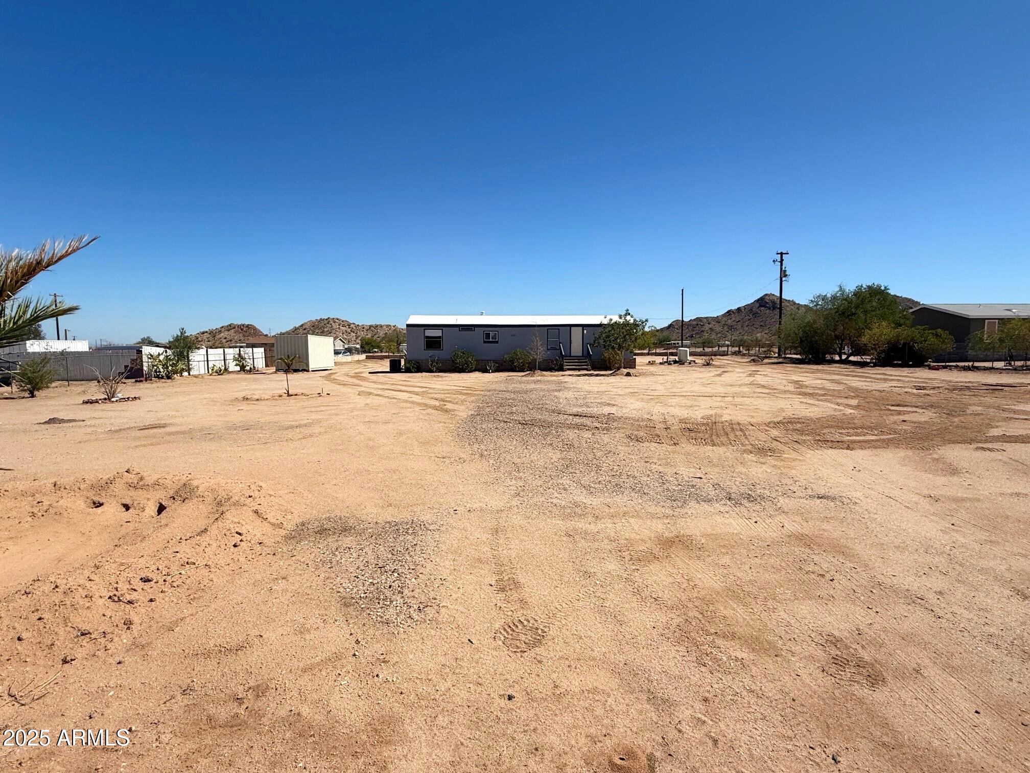 373 South Amarillo Valley Road Maricopa, AZ 85139 - Photo 4 of 23 a view of beach and mountain