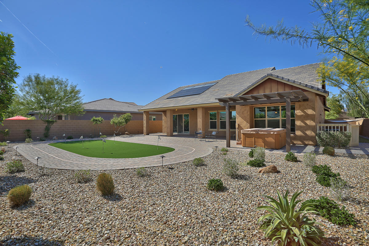 20501 West Ridge Road Buckeye, AZ 85396 - Photo 31 of 33 LOVELY BACKYARD W/PUTTING GREEN