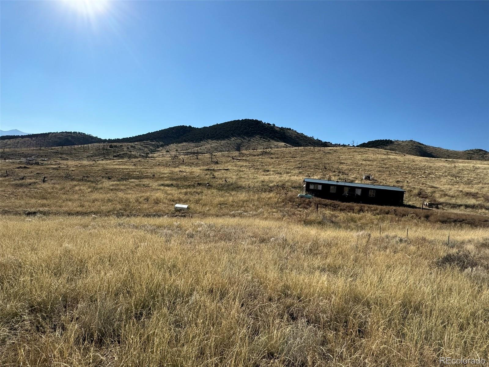 0 Copper Gulch Road Cotopaxi, CO 81223 - Photo 10 of 48 a view of an mountain with sunset in background