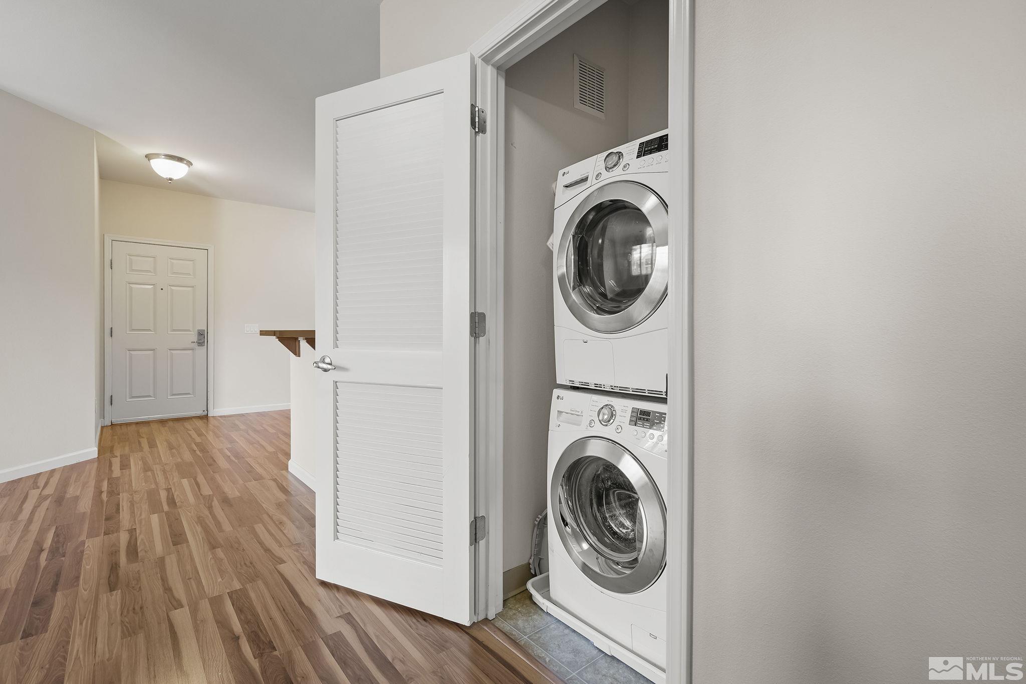 1450 Idlewild Drive, Unit 933 Reno, NV 89509 - Photo 20 of 32 a view of a hallway with washer and dryer