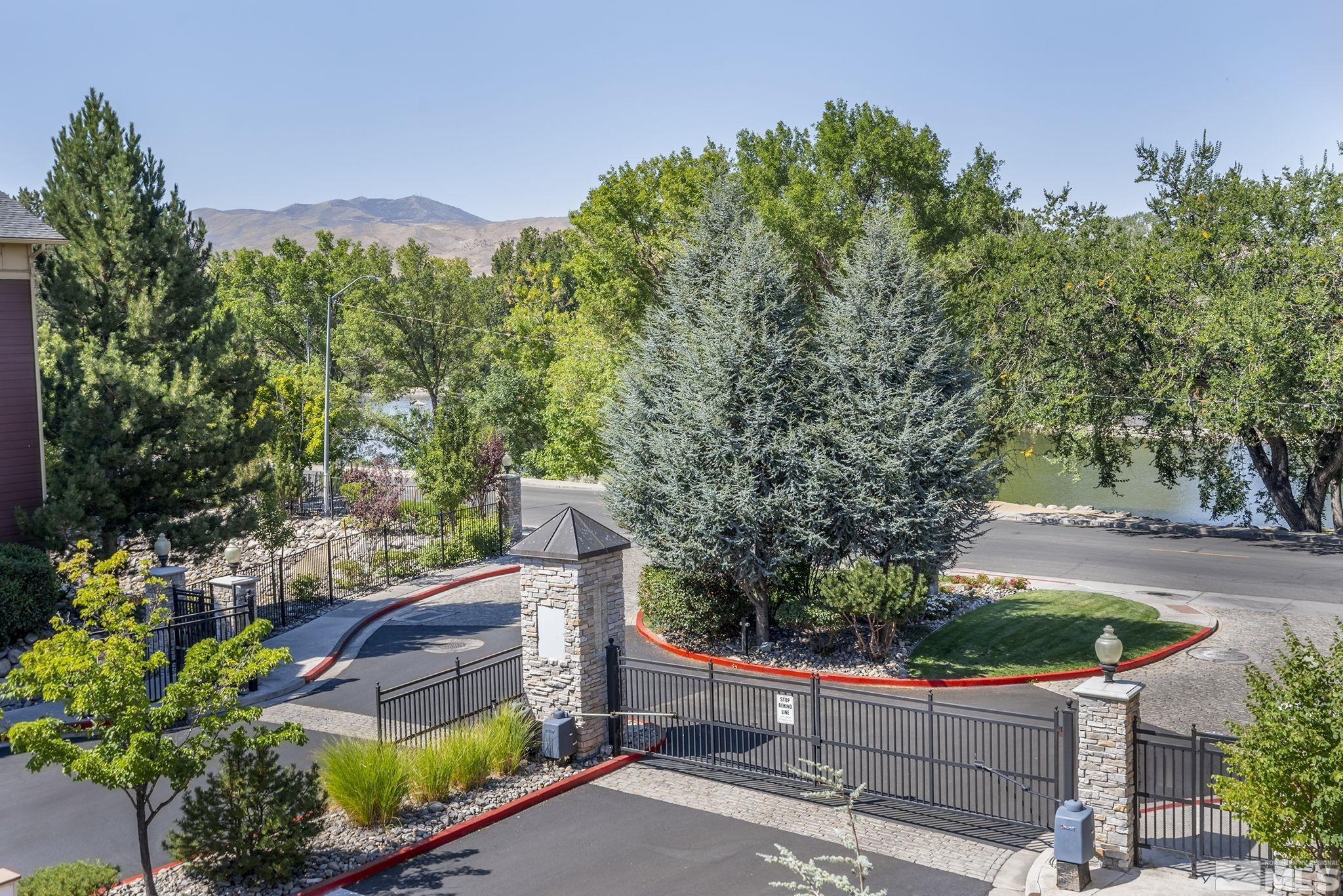 1450 Idlewild Drive, Unit 933 Reno, NV 89509 - Photo 22 of 32 a view of a backyard with plants
