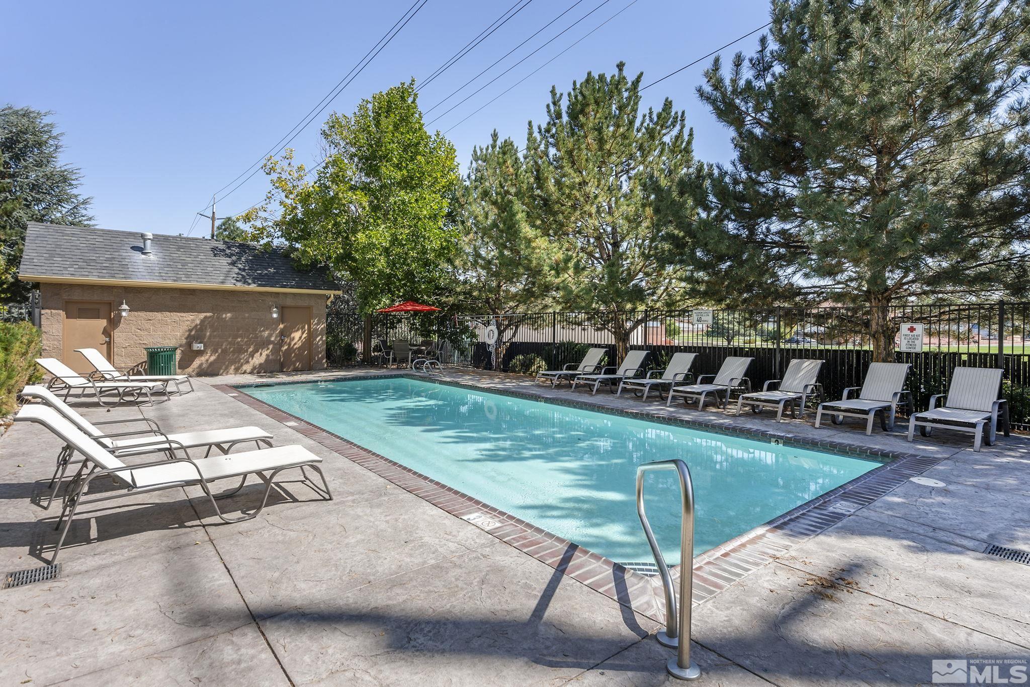 1450 Idlewild Drive, Unit 933 Reno, NV 89509 - Photo 25 of 32 a view of a backyard with sitting area