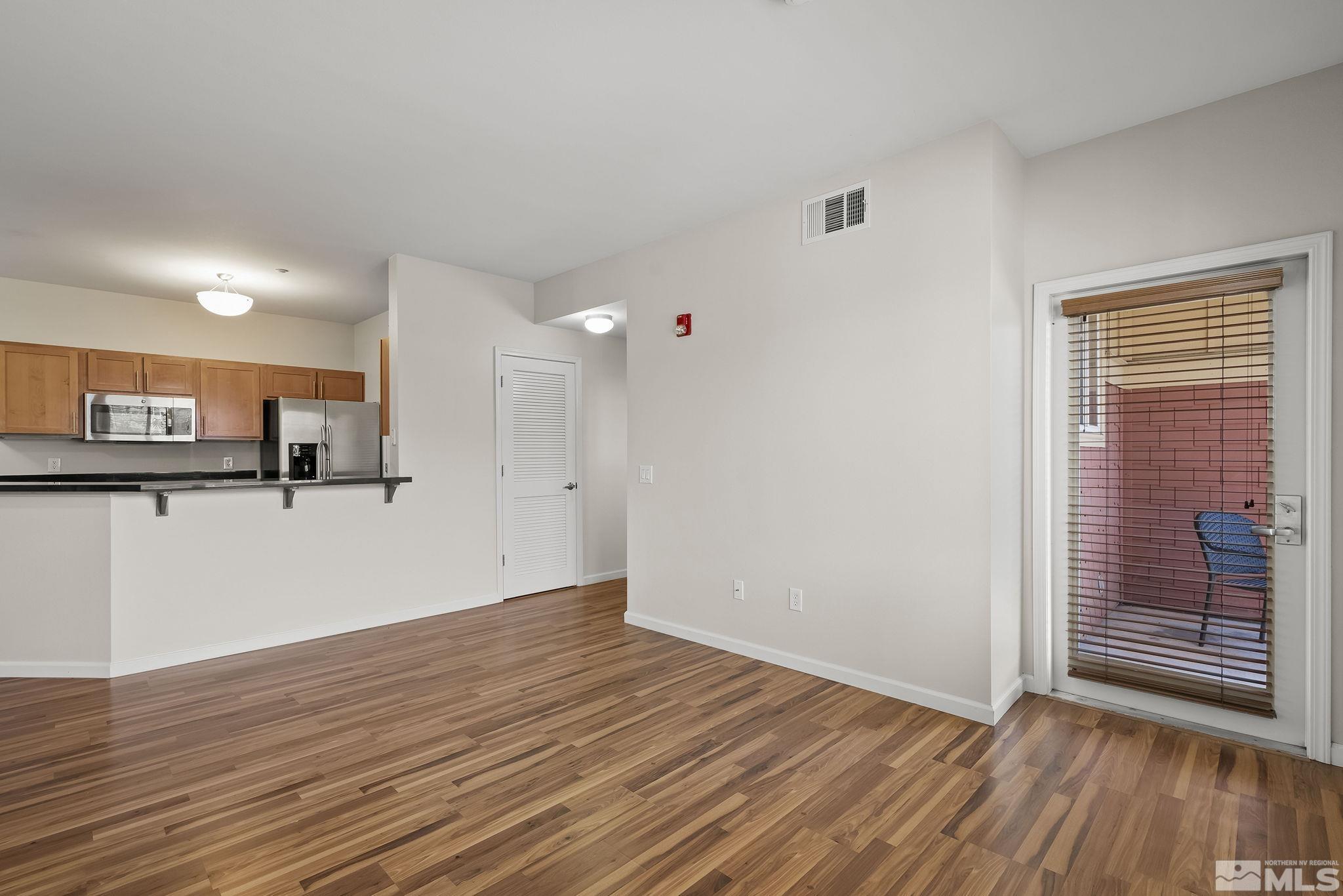 1450 Idlewild Drive, Unit 933 Reno, NV 89509 - Photo 5 of 32 a view of kitchen with wooden floor