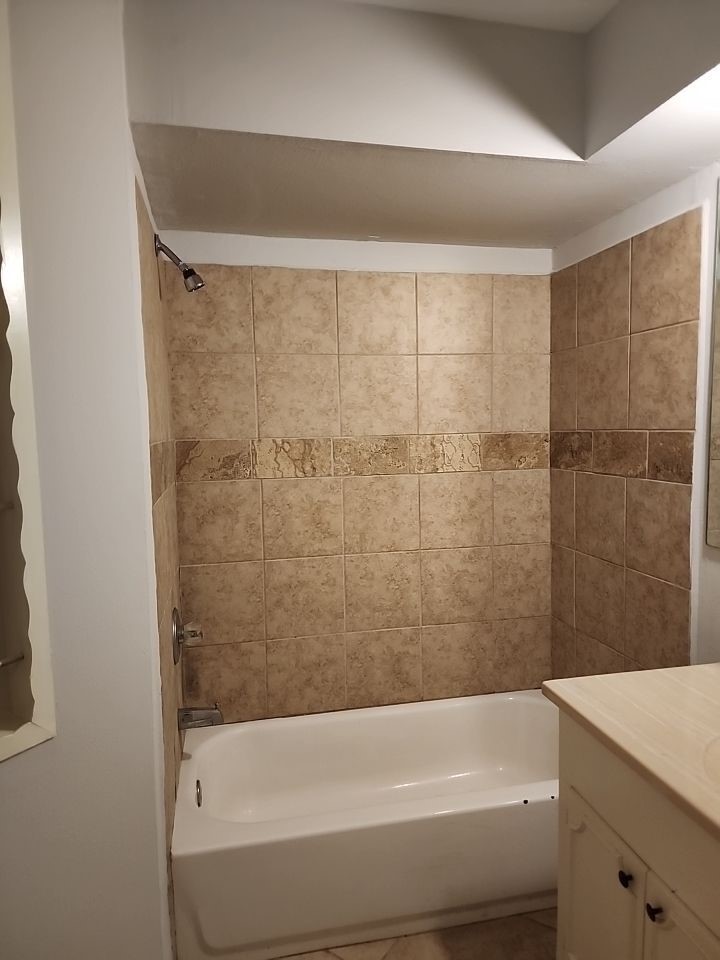 2903 Crossfell Road Spring, TX 77388 - Photo 11 of 13 a bathroom with a bathtub and shower