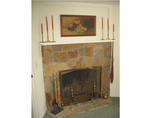 11 Cayuga Road Charlestown, RI 02813 - Photo 4 of 12 Living Room. Stone fireplace...