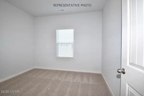 a view of a room that has a window in it