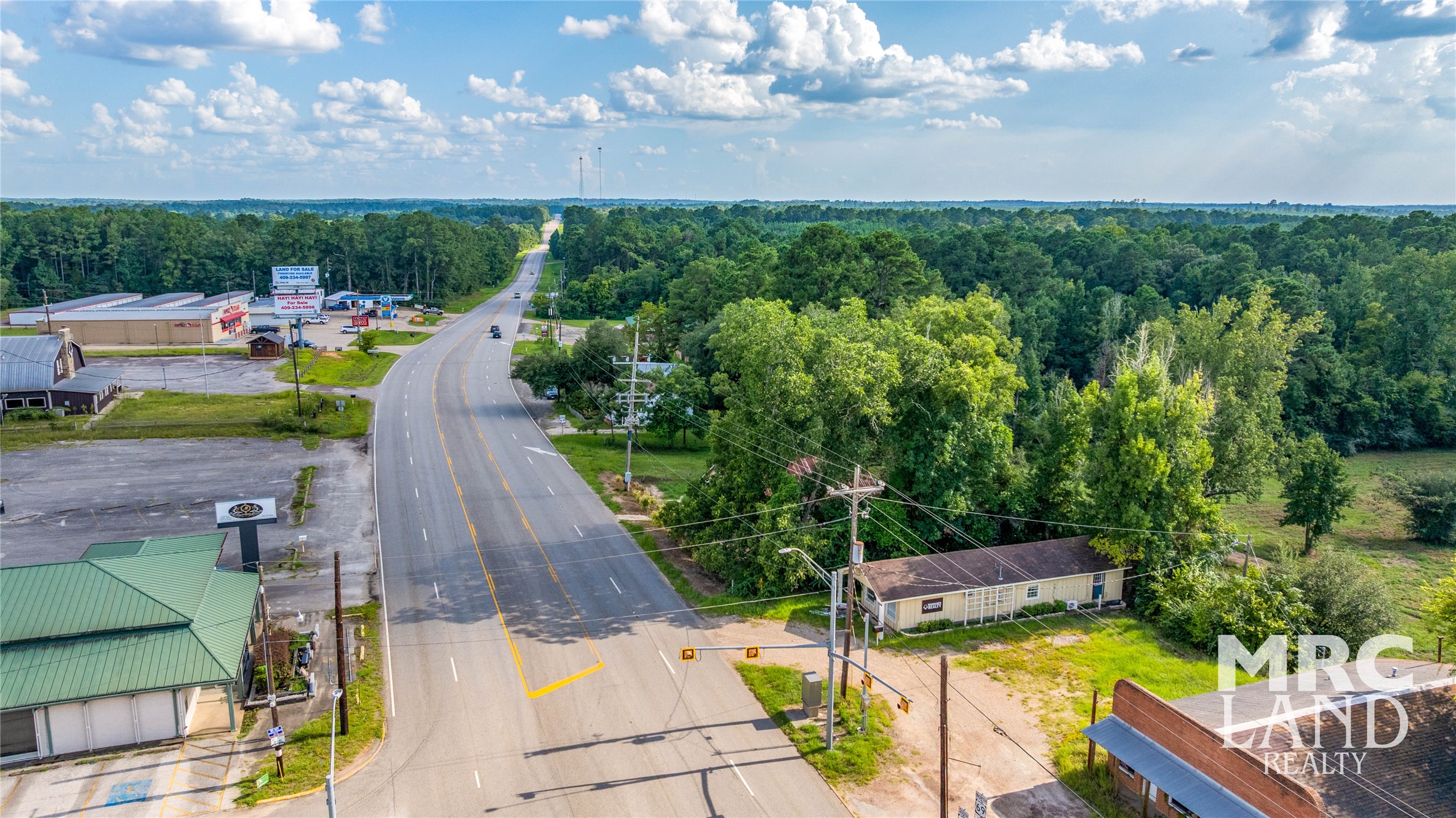 102 South Wheeler Avenue Colmesneil, TX 75938 - Photo 2 of 17 a view of yard from outdoor seating