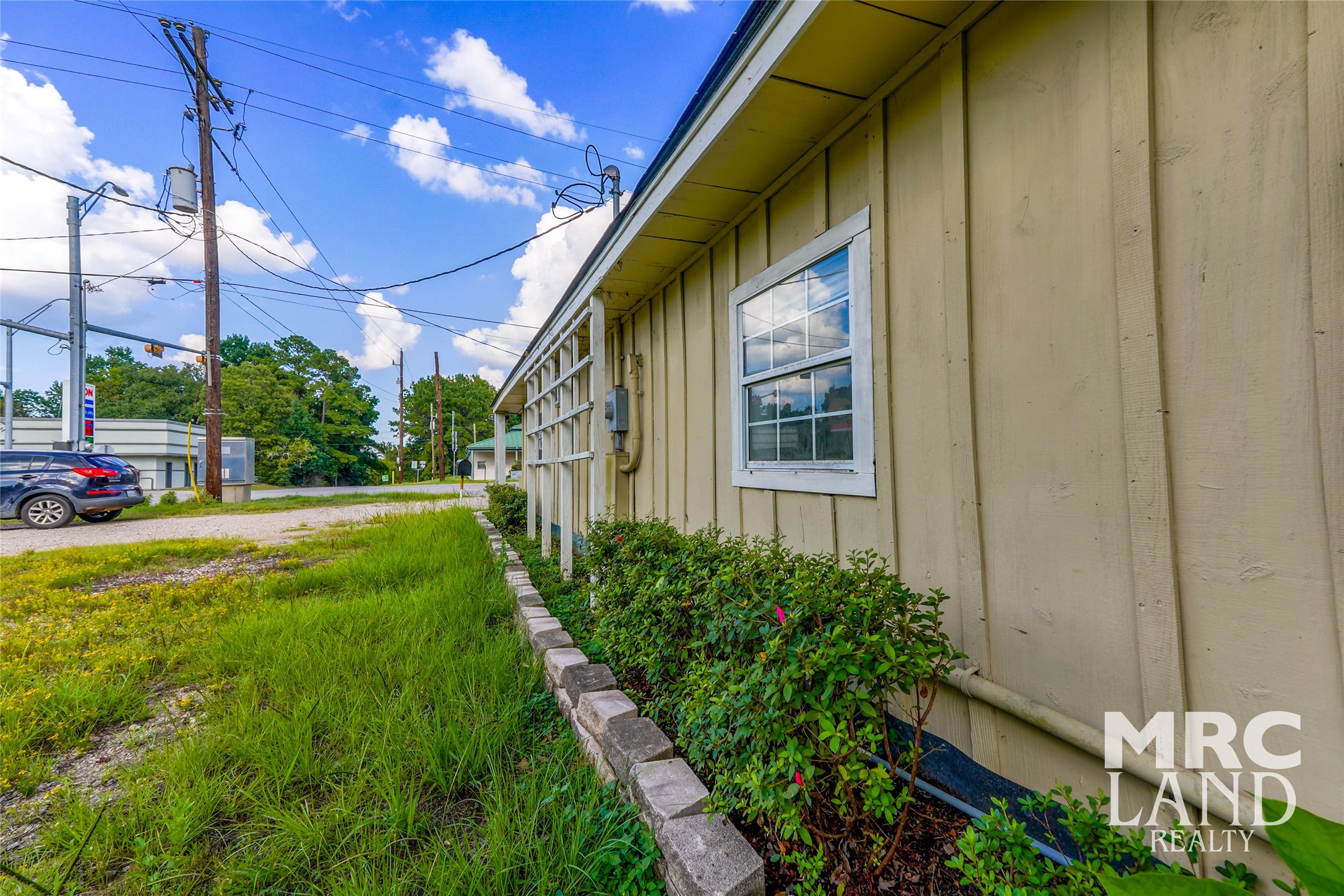 102 South Wheeler Avenue Colmesneil, TX 75938 - Photo 3 of 17 a view of a house with a yard