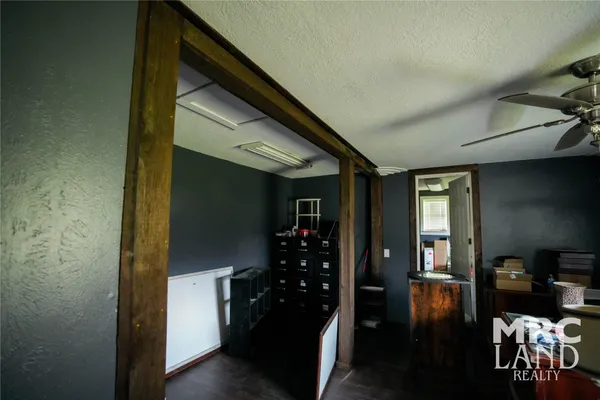 a hallway with dining room and livingroom view