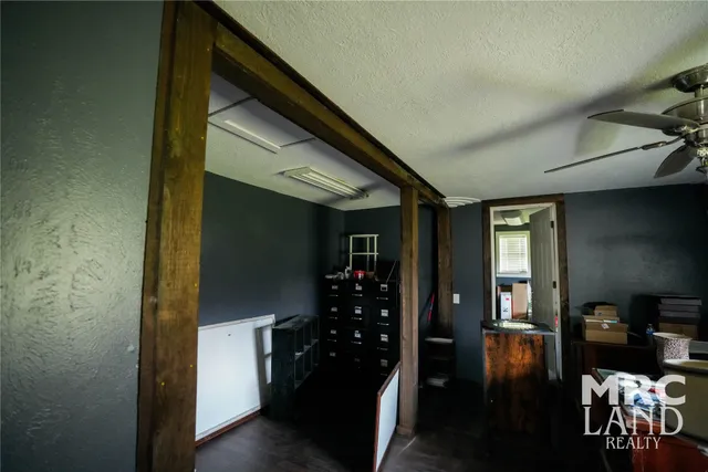 a hallway with dining room and livingroom view