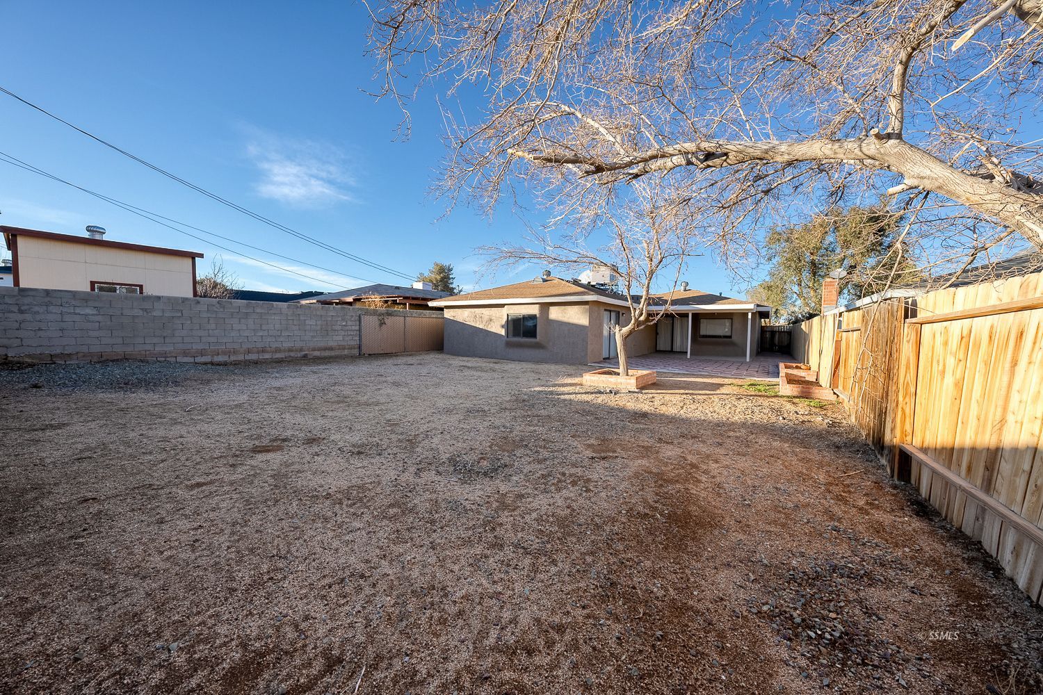 609 West Joyner Avenue Ridgecrest, CA 93555 - Photo 21 of 29 a view of a backyard with seating space