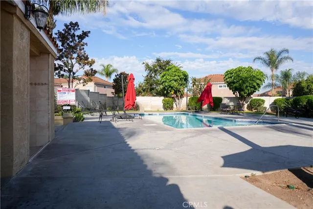 a view of a park with plants and a bench