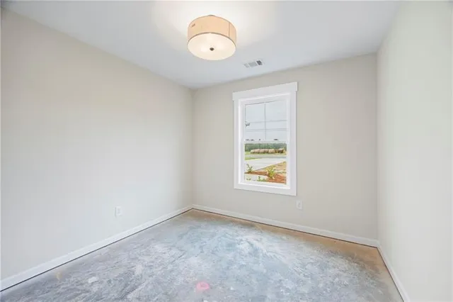 an empty room with windows