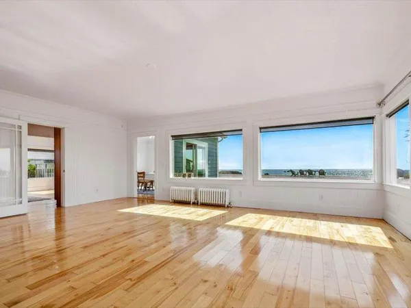 a view of a living room with furniture