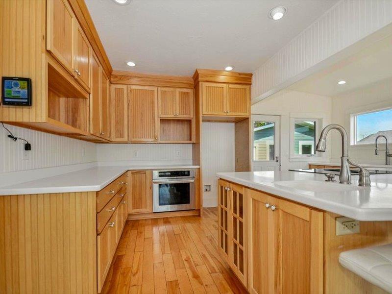 183 Lighthouse Way Crescent City, CA 95531 - Photo 19 of 87 a kitchen with stainless steel appliances granite countertop a sink and a stove