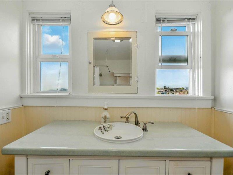 183 Lighthouse Way Crescent City, CA 95531 - Photo 46 of 87 a bathroom with a sink and a mirror