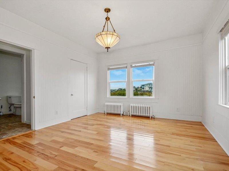 183 Lighthouse Way Crescent City, CA 95531 - Photo 49 of 87 a view of empty room with wooden floor and fan
