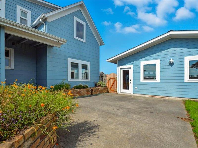 183 Lighthouse Way Crescent City, CA 95531 - Photo 65 of 87 a backyard of a house with seating space