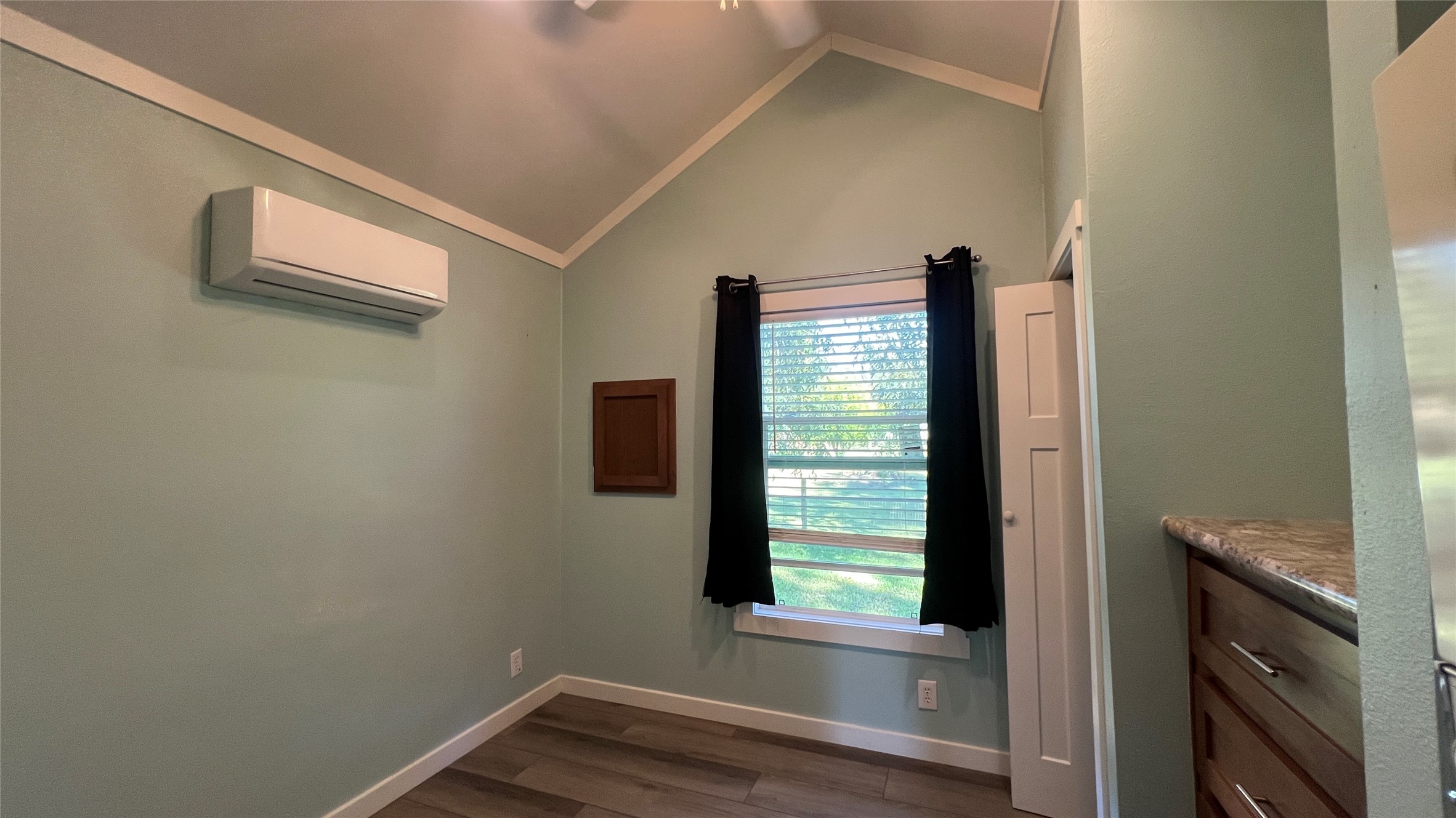 103 Pitts Road, Unit C Richmond, TX 77406 - Photo 3 of 7 a view of an empty room with a window