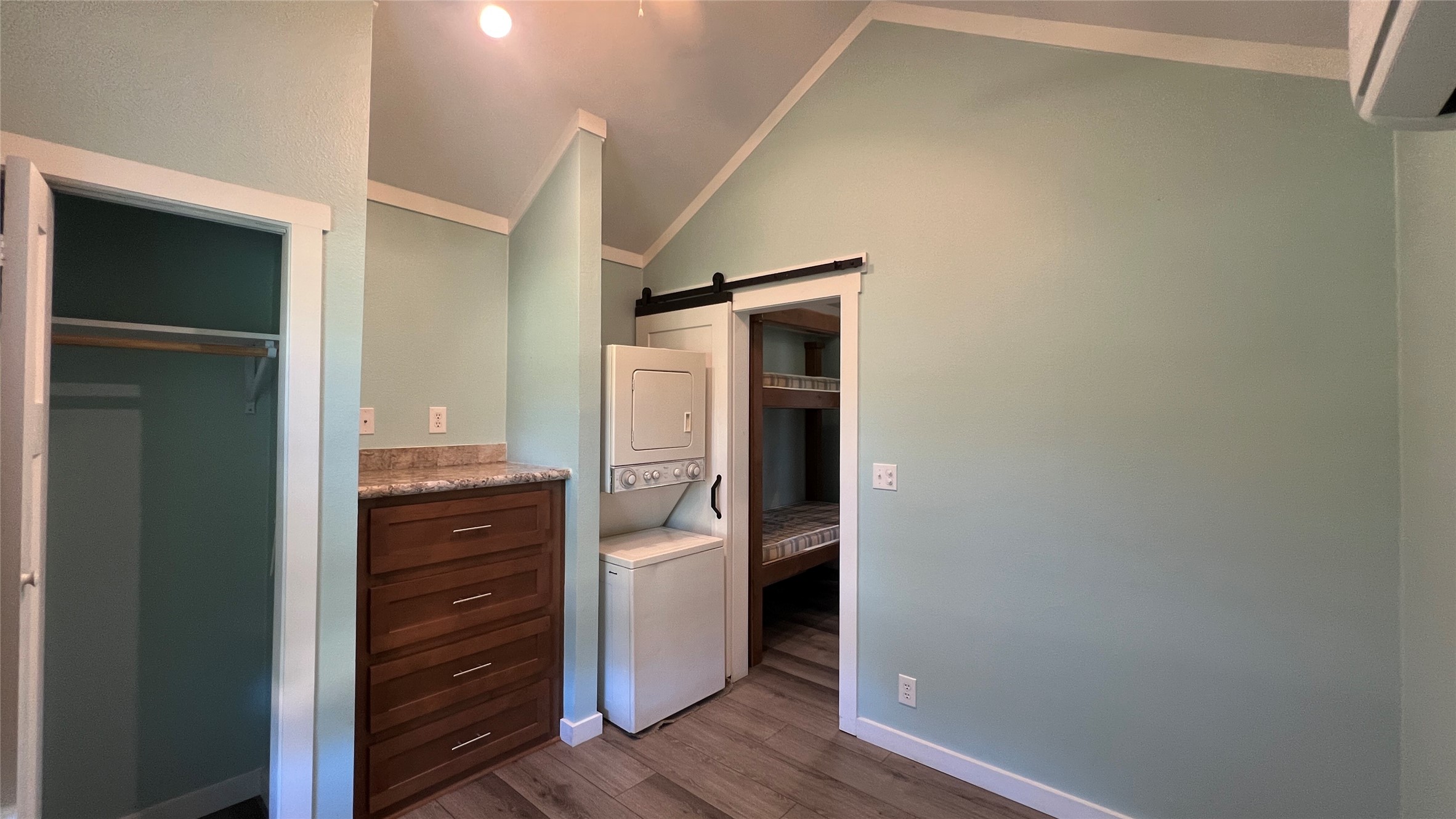 103 Pitts Road, Unit C Richmond, TX 77406 - Photo 4 of 7 a room with closet and wooden floor
