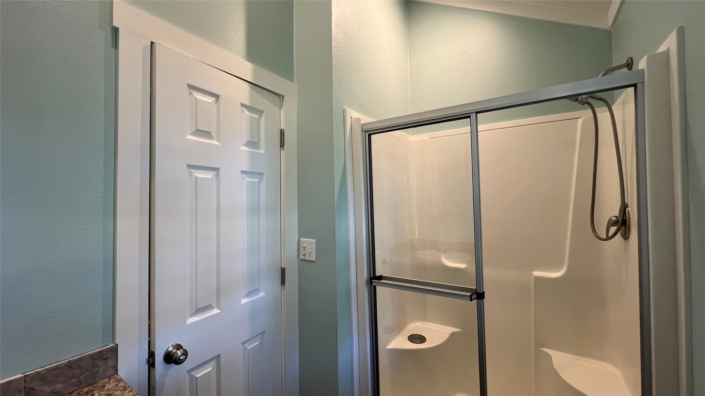 103 Pitts Road, Unit C Richmond, TX 77406 - Photo 7 of 7 a bathroom with a glass shower door