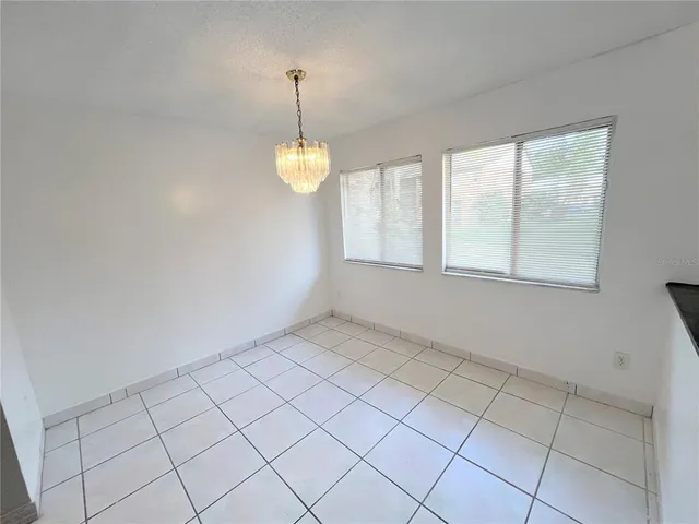 an empty room that has a window