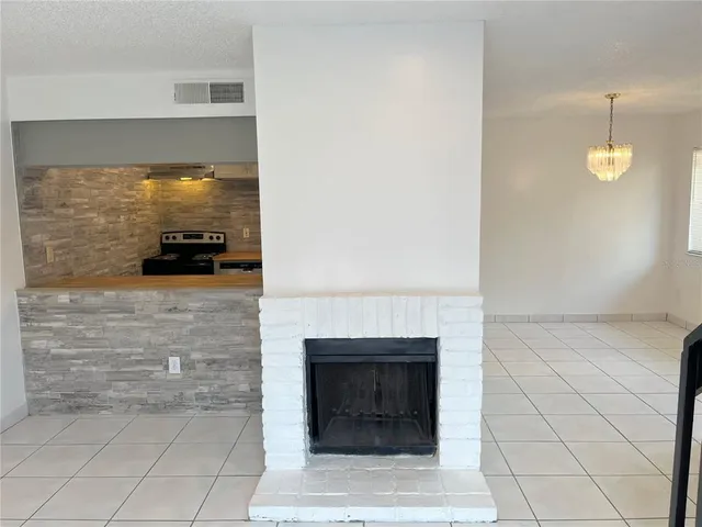 a view of a livingroom with a fireplace