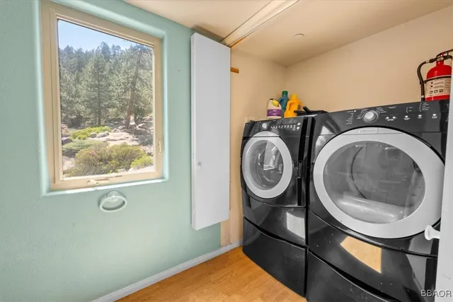 a view of washer and dryer in a utility room