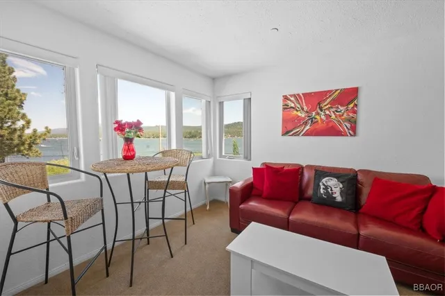 a view of a livingroom with furniture and a couch