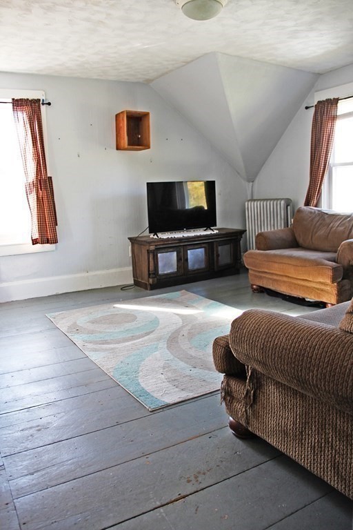 64 High Street Gardner, MA 01440 - Photo 11 of 20 a living room with furniture and a flat screen tv