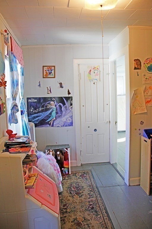 64 High Street Gardner, MA 01440 - Photo 14 of 20 a view of a bedroom with a bed and a painting on the wall