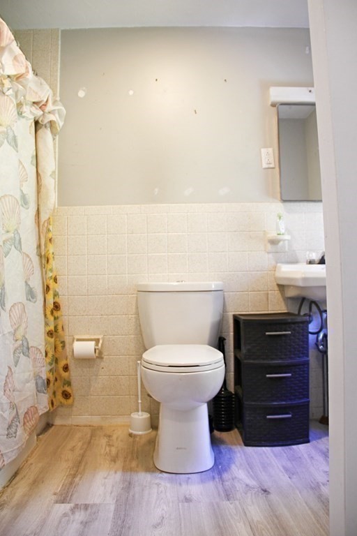 64 High Street Gardner, MA 01440 - Photo 16 of 20 a bathroom with a sink toilet and shower