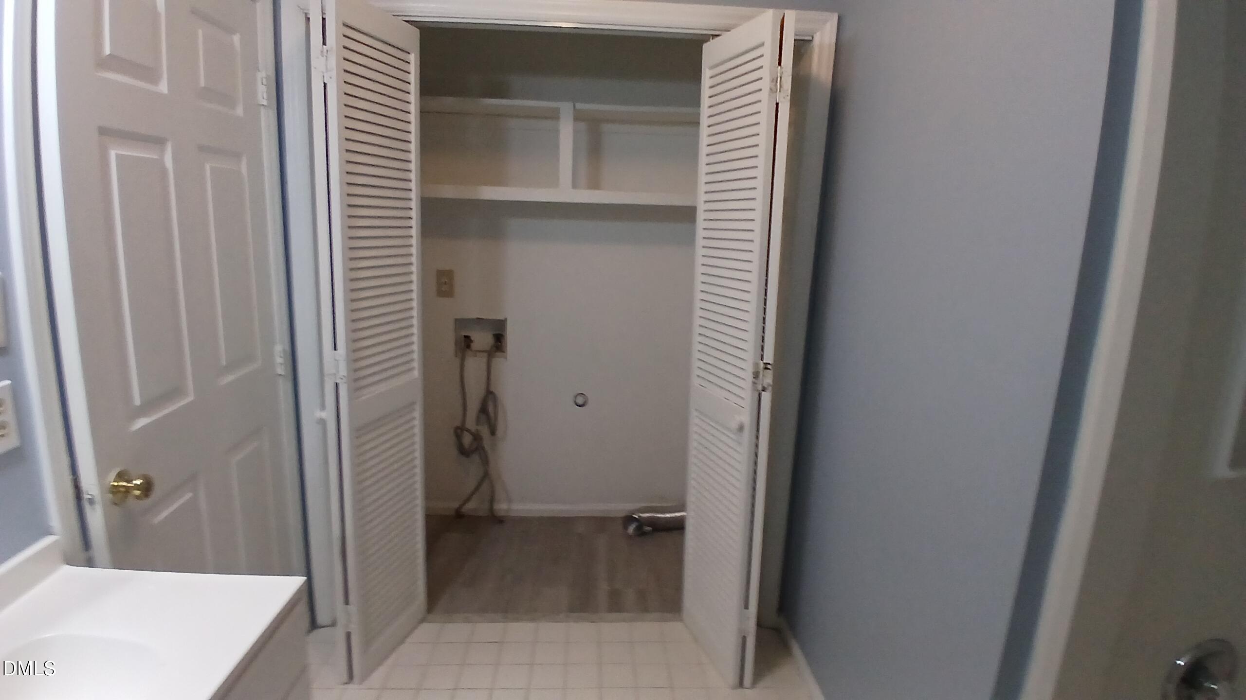 3504 East Jameson Road Raleigh, NC 27604 - Photo 20 of 35 a view of a bathroom from a hallway