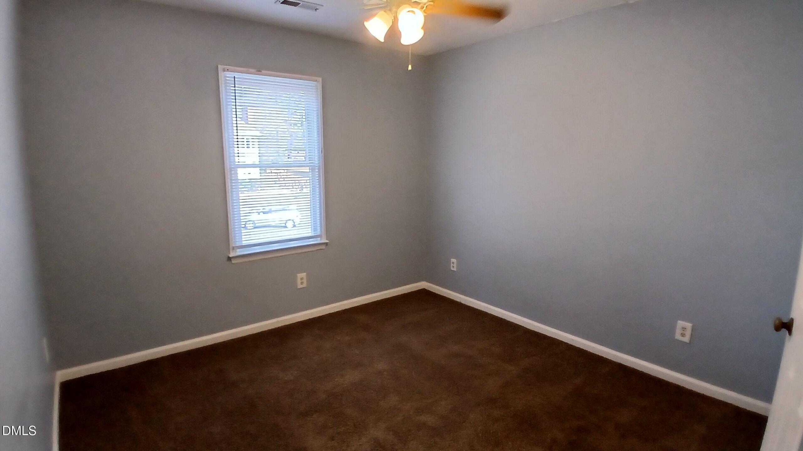 3504 East Jameson Road Raleigh, NC 27604 - Photo 25 of 35 an empty room with windows and closet