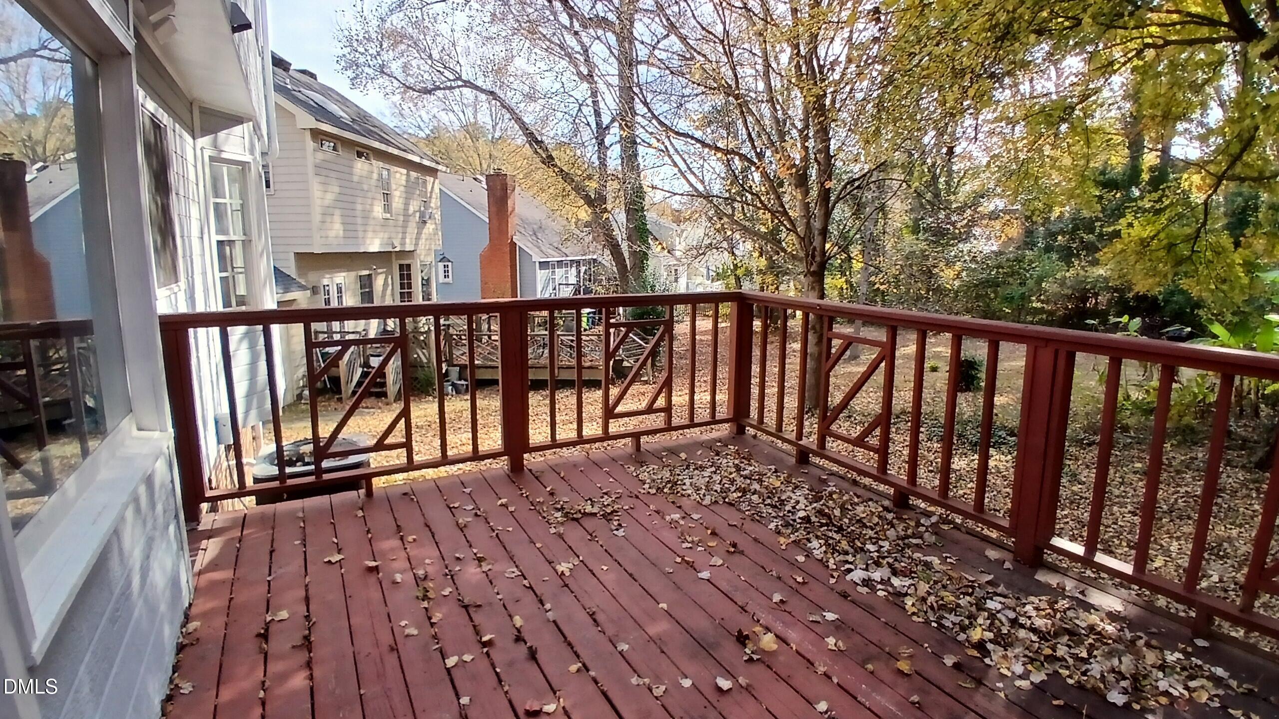 3504 East Jameson Road Raleigh, NC 27604 - Photo 32 of 35 a view of a balcony with wooden floor and fence